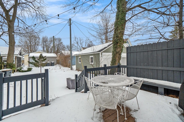 view of snow covered deck