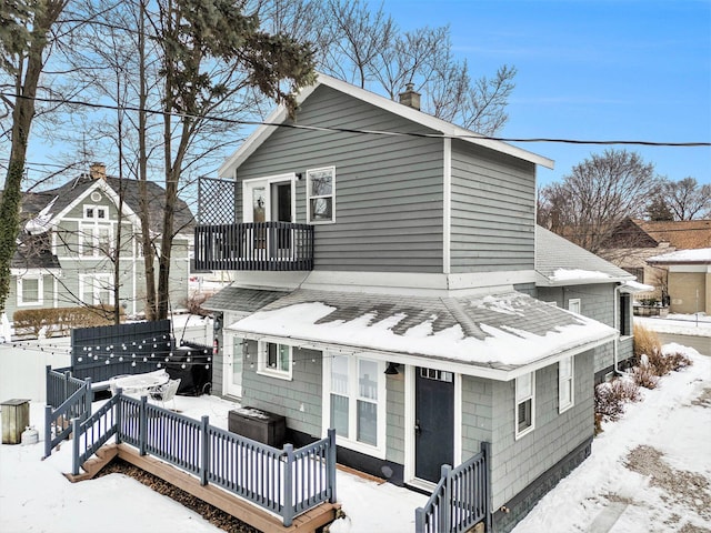 view of snow covered property