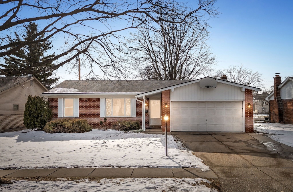 ranch-style home with a garage