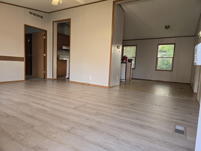 unfurnished room with crown molding, ceiling fan, and light hardwood / wood-style floors