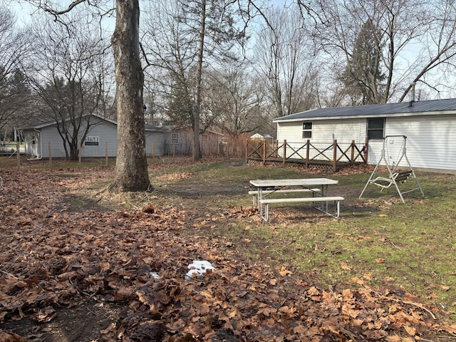 view of yard with a deck