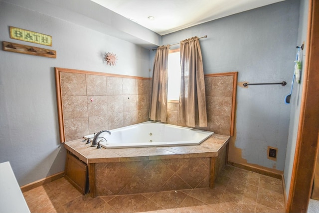 bathroom featuring tiled bath