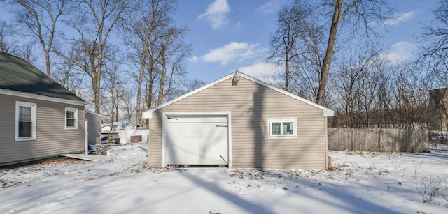 view of snow covered garage