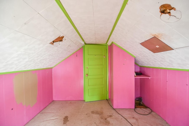 bonus room with vaulted ceiling