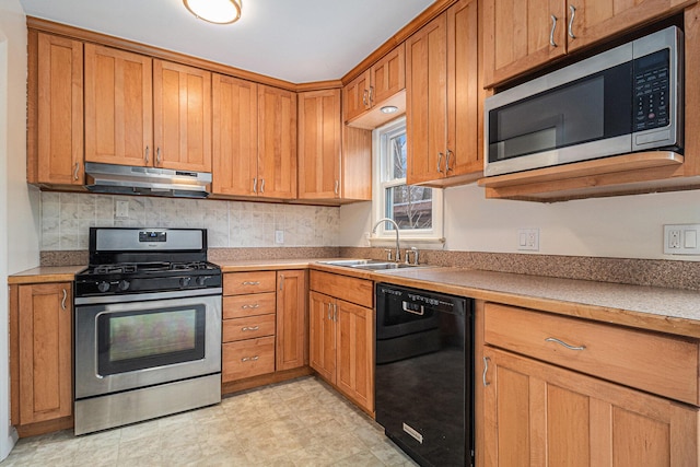 kitchen featuring stainless steel appliances and sink