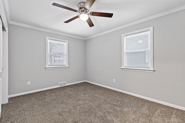 carpeted empty room featuring crown molding and ceiling fan