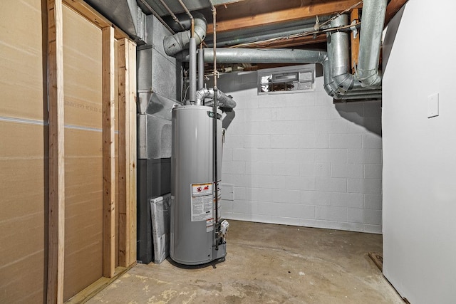 utility room featuring gas water heater