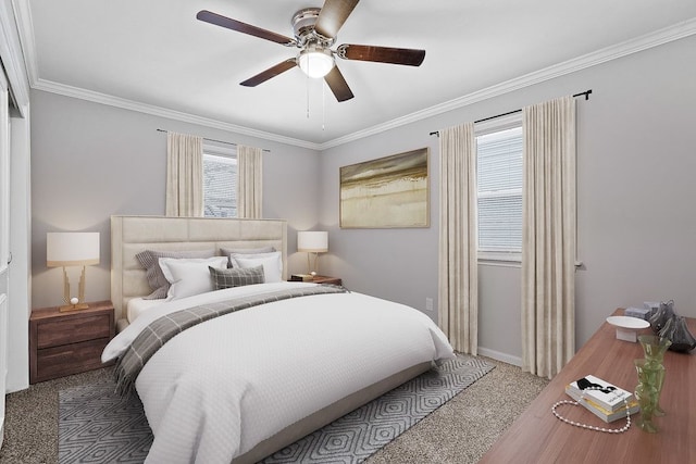 carpeted bedroom with ceiling fan and ornamental molding