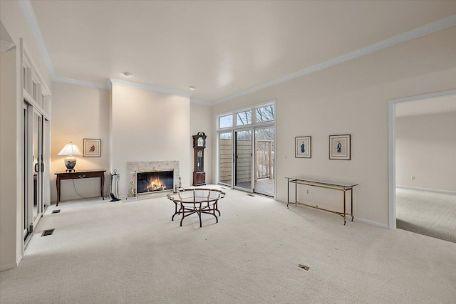 living room featuring light carpet, crown molding, and a high end fireplace