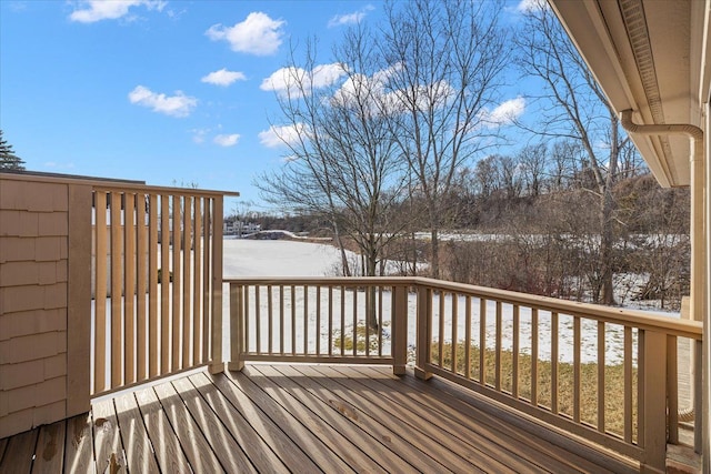 view of snow covered deck