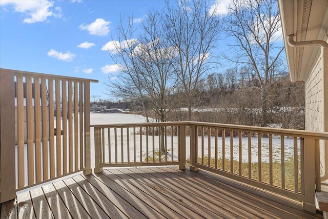 view of snow covered deck