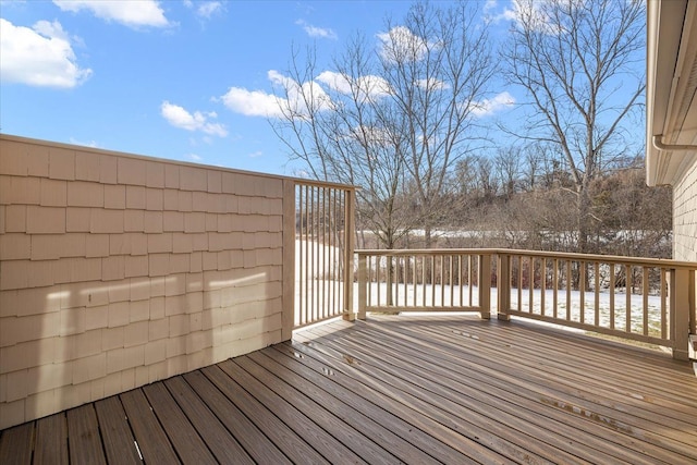 view of snow covered deck