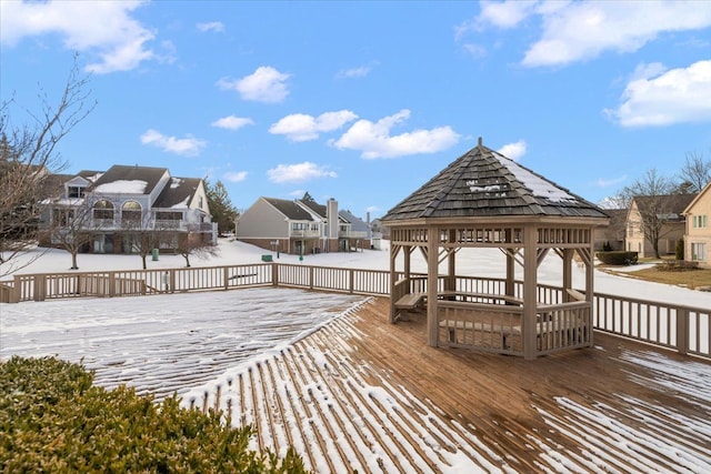 snow covered deck featuring a gazebo