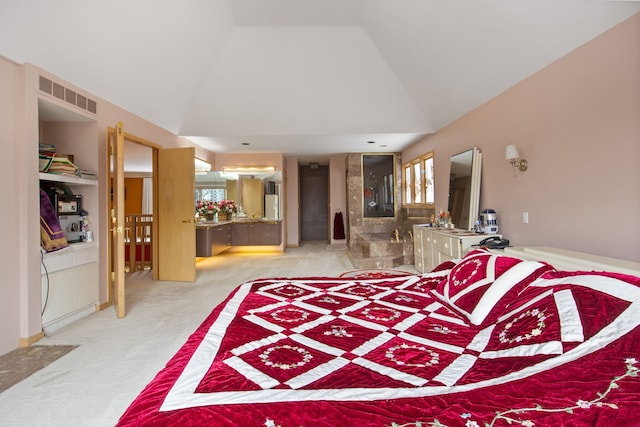 interior space with high vaulted ceiling and light colored carpet