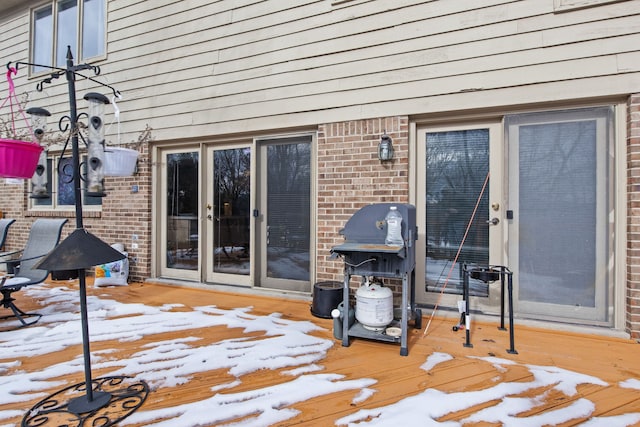 view of snow covered deck