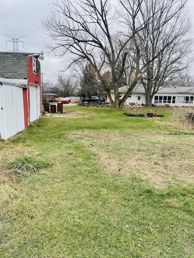 view of yard with a garage