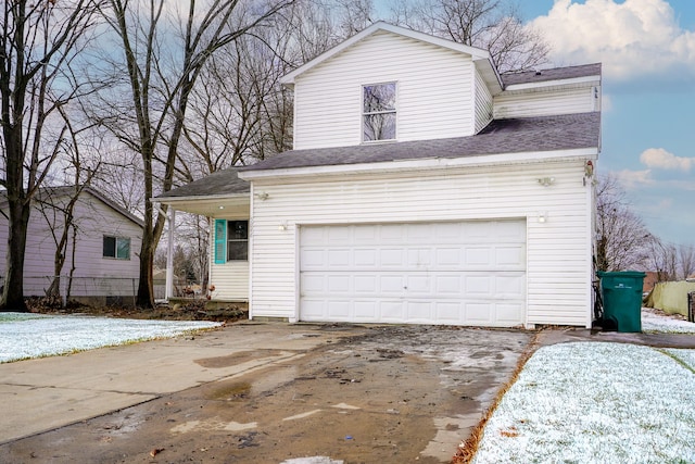 front of property with a garage