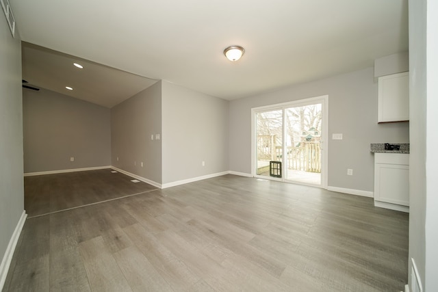 unfurnished living room with light hardwood / wood-style floors