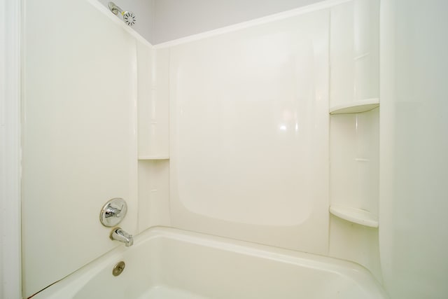 bathroom featuring washtub / shower combination