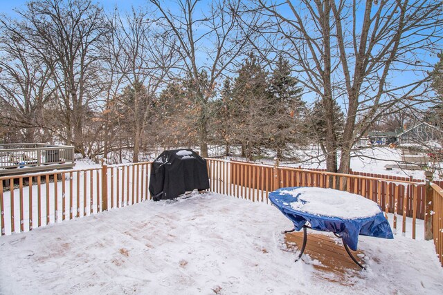 view of snow covered deck