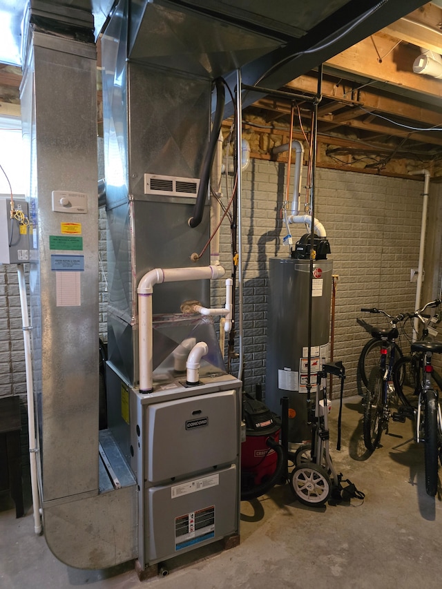 utility room with water heater