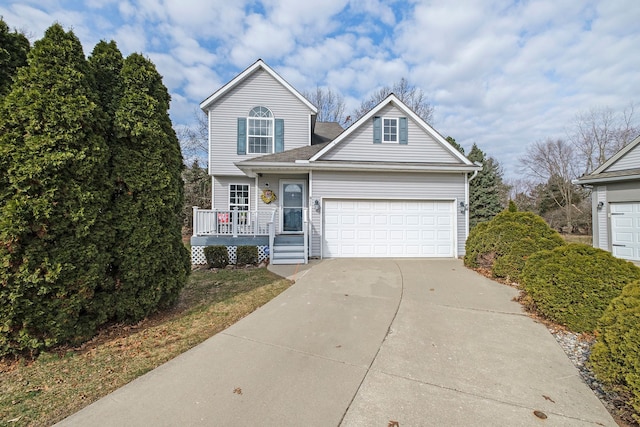 traditional home with a garage, a porch, and concrete driveway