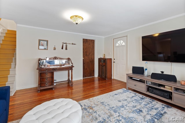 living room with ornamental molding and dark hardwood / wood-style flooring