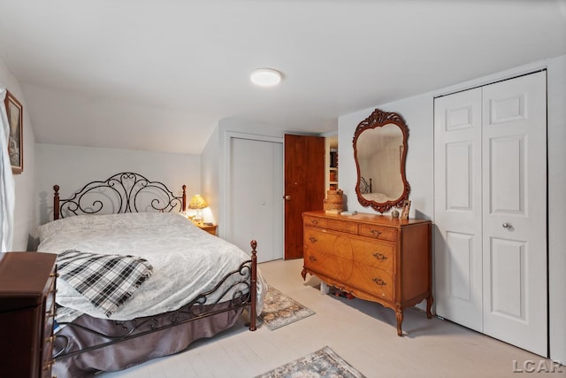 bedroom featuring two closets