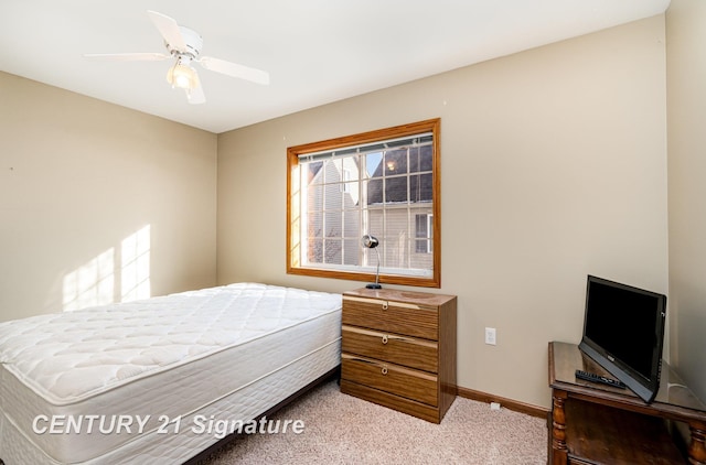 bedroom featuring ceiling fan, baseboards, and carpet flooring