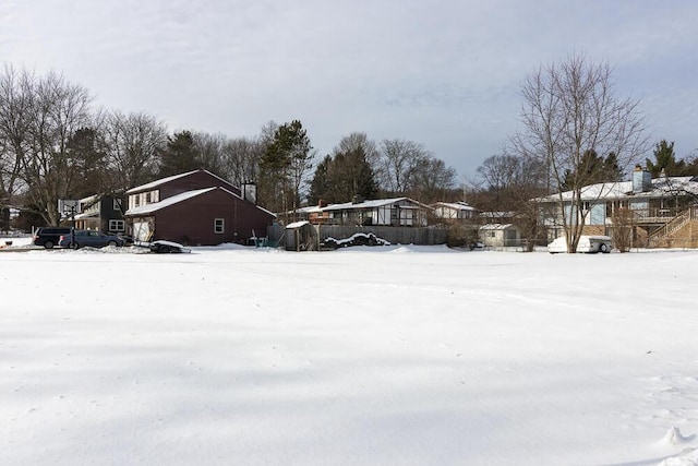 view of yard covered in snow