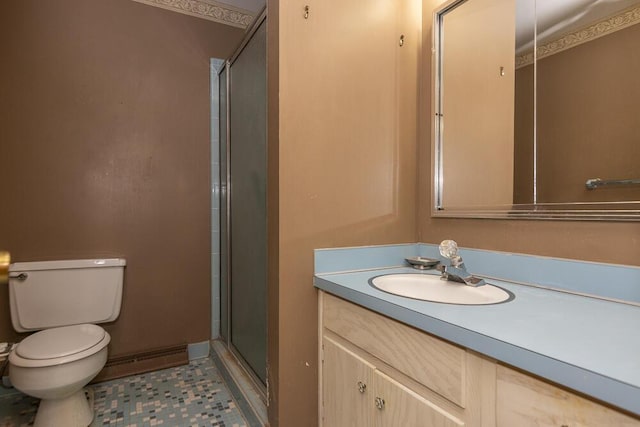 bathroom featuring vanity, toilet, an enclosed shower, and a baseboard heating unit