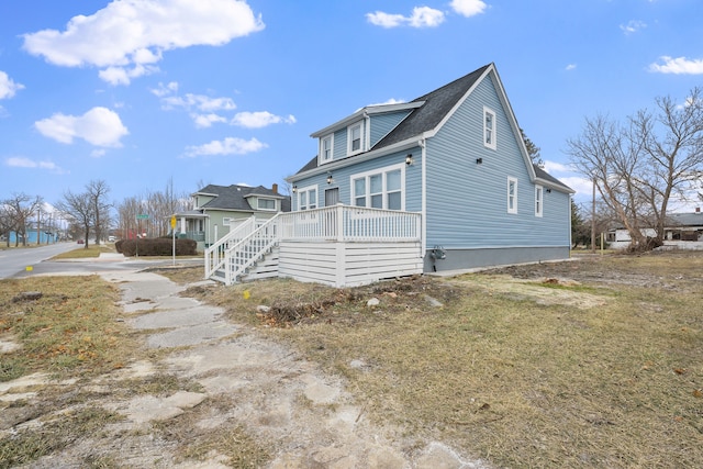 exterior space featuring a wooden deck