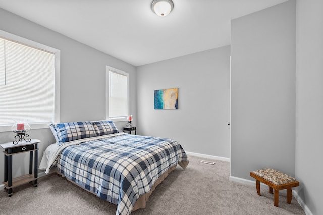 bedroom featuring carpet