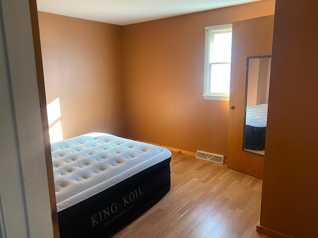 bedroom featuring light wood-type flooring