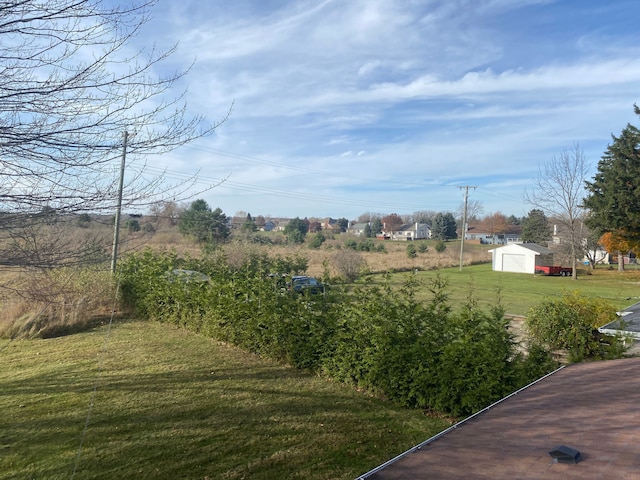 view of yard with a shed