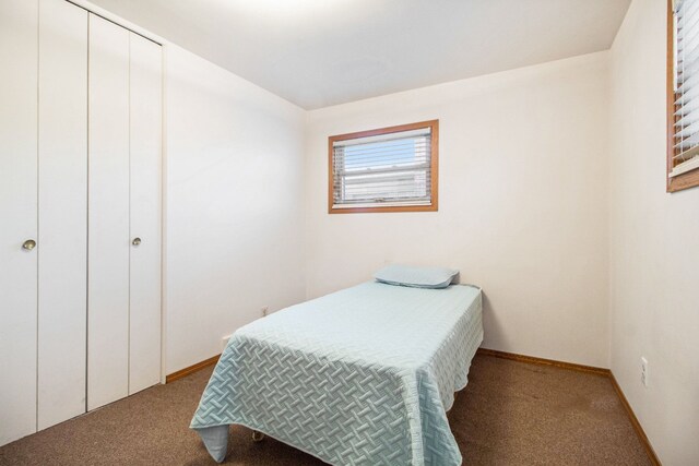 bedroom with light colored carpet