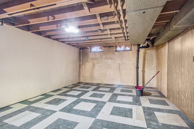 basement with tile patterned floors