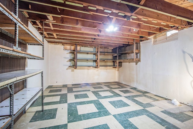 unfinished basement with tile patterned floors