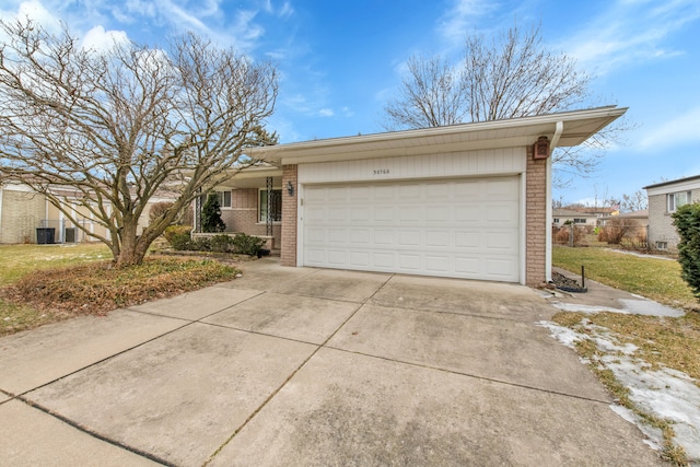 single story home featuring a garage