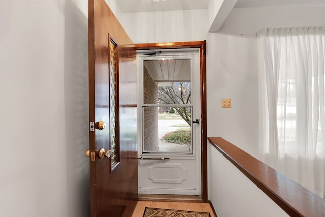 entryway with light hardwood / wood-style flooring