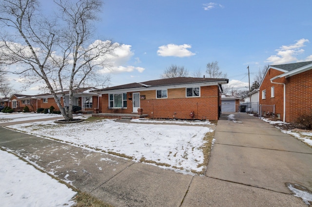 view of front of house with a garage and an outdoor structure