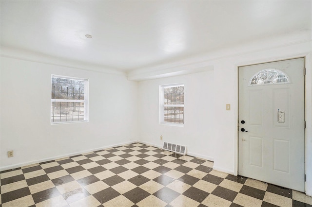 foyer entrance with crown molding