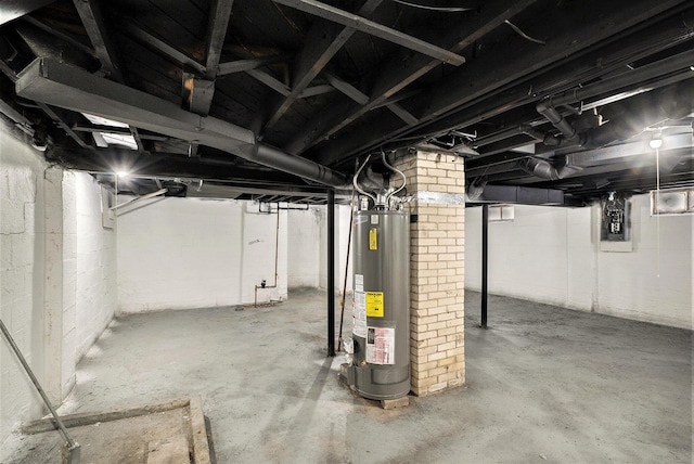 basement with gas water heater and electric panel