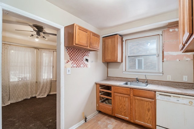 kitchen featuring ceiling fan, white dishwasher, light hardwood / wood-style floors, and sink