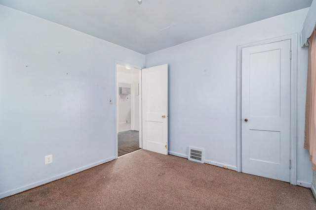 unfurnished bedroom with carpet flooring