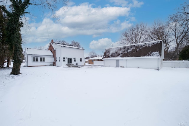 view of snow covered property