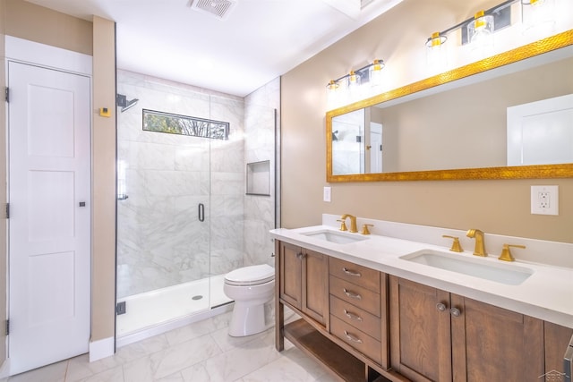 bathroom with an enclosed shower, vanity, and toilet