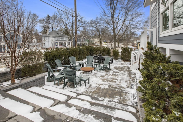 view of snow covered patio