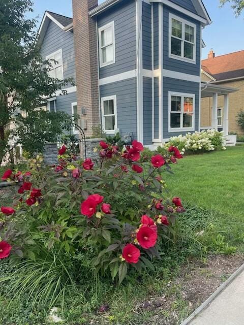 view of home's exterior featuring a yard