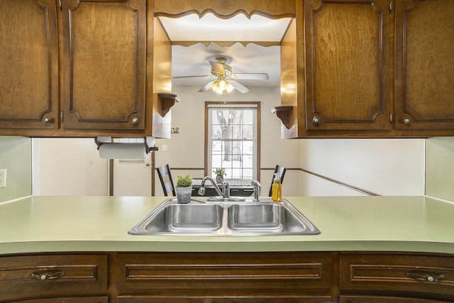 kitchen featuring sink and ceiling fan